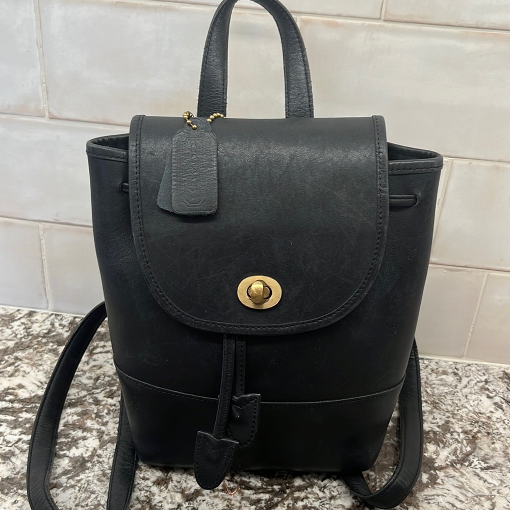 black leather “backpack” purse